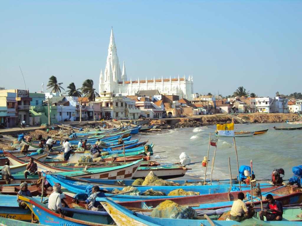 Colored boats and white church