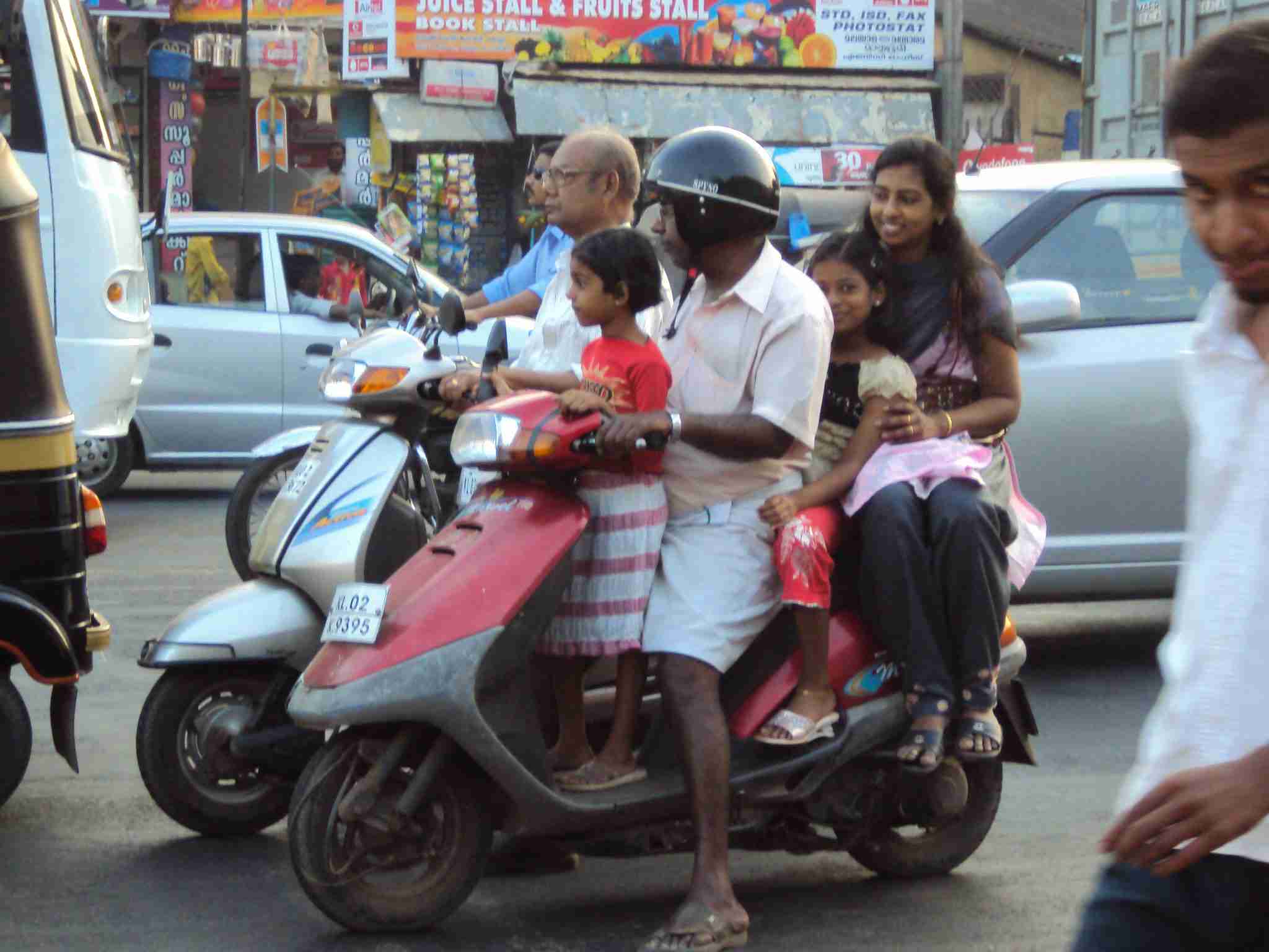 A whole family on a motorcycle