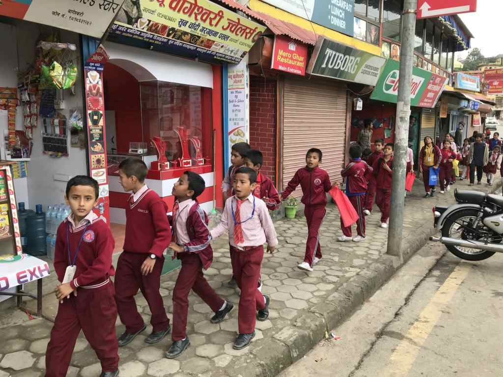 School children on the way to school